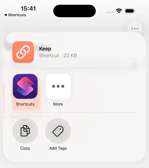 A clean iPhone share sheet with the Shortcuts app ready to select.